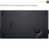 Dell P6524QT rear view 65 inch monitor. The back view of a Dell P6524QT 65-inch 4K UHD interactive touch monitor, showing a matte black chassis with mounting feet and a small port on the lower right, set against a white background with text overlays.