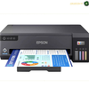Epson EcoTank L11050 Borderless Colour Photo Printing | L11050. An Epson printer shown from the front on a white background, with a printed page partially ejected from the paper tray. The printer is dark gray/black with a small color display on the right and four ink tanks visible.