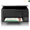 Epson EcoTank L3350 Compact Wireless Printer Side View | L3350. An Epson printer with its lid open, showing a printed document coming out of the paper tray. The printer is black with four color indicator tanks on the front right.