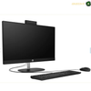HP 24-cr0300nh All-in-One Desktop side view | B59U8EA#BH5. A white all-in-one desktop computer with a large monitor, keyboard, and mouse on a plain white background. The monitor displays a blue-themed desktop interface, and a small logo is visible at the bottom center of the bezel.