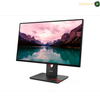 Lenovo desktop monitor with a slim black bezel and stand, displaying a mountain lake landscape on a white background.