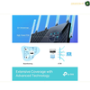 TP-Link Archer AX72 Router with Six Fixed High-Performance Antennas. Promotional graphic for a tp-link router featuring 6 antennas, high-power FEM, beamforming, and 4G4R technology, with text stating 'Extensive Coverage with Advanced Technology' and the tp-link logo.
