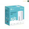 TP-Link Archer NX200 5G router with Nano SIM connectivity | NX200. TP-Link 5G CPE Router AX1800 dual-band Wi-Fi 6 retail packaging box, shown at a three-quarter angle on a white background.