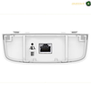 TP-Link EAP603-Outdoor IP65 weatherproof access point for outdoor wireless networking. White plastic network camera wall mount cover with a RJ45 Ethernet port and a mounting screw, shown from the back on a white background.